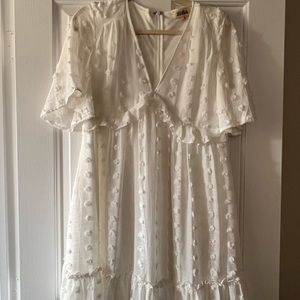 white dress worn to bridal shower